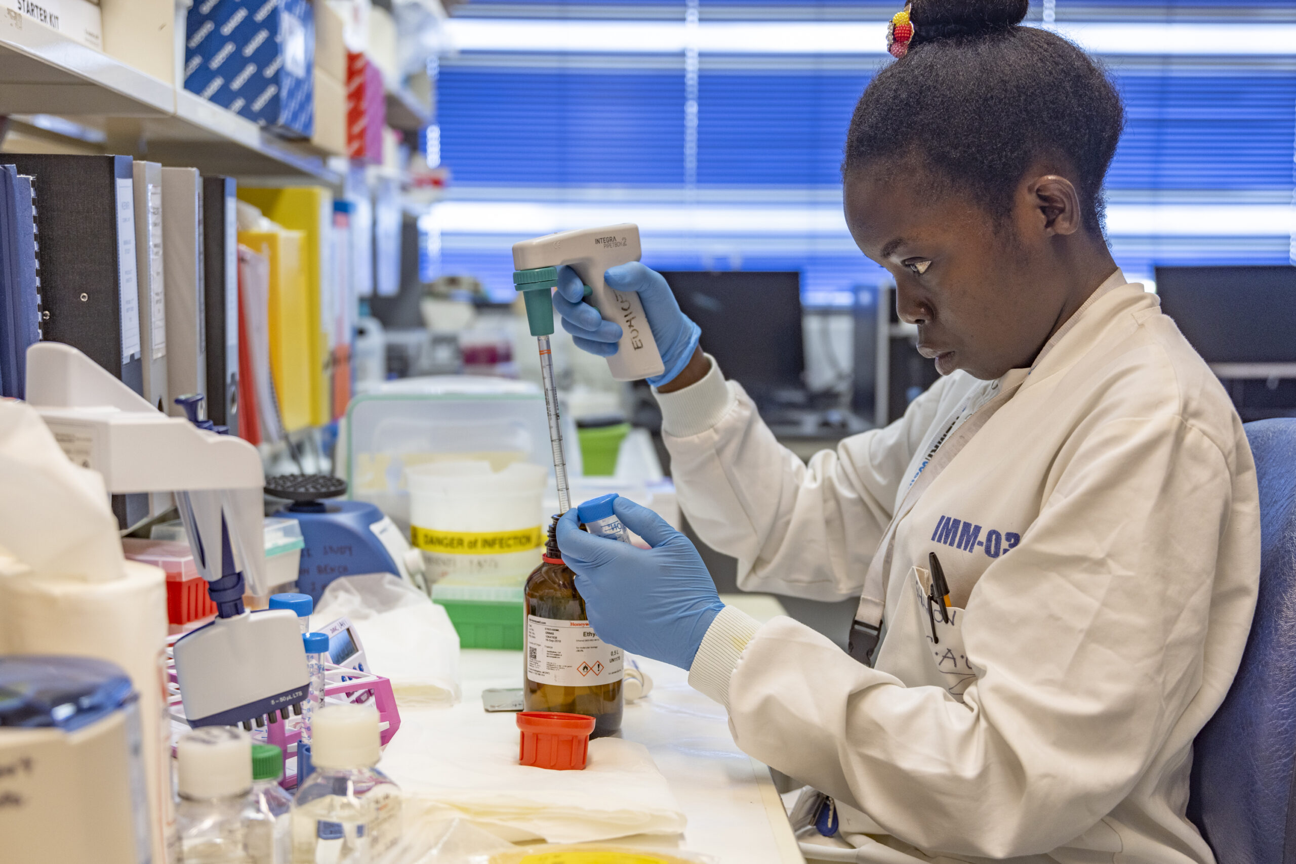 Sharon Owuor testing samples at KEMRI Kilifi on 31st August 2022