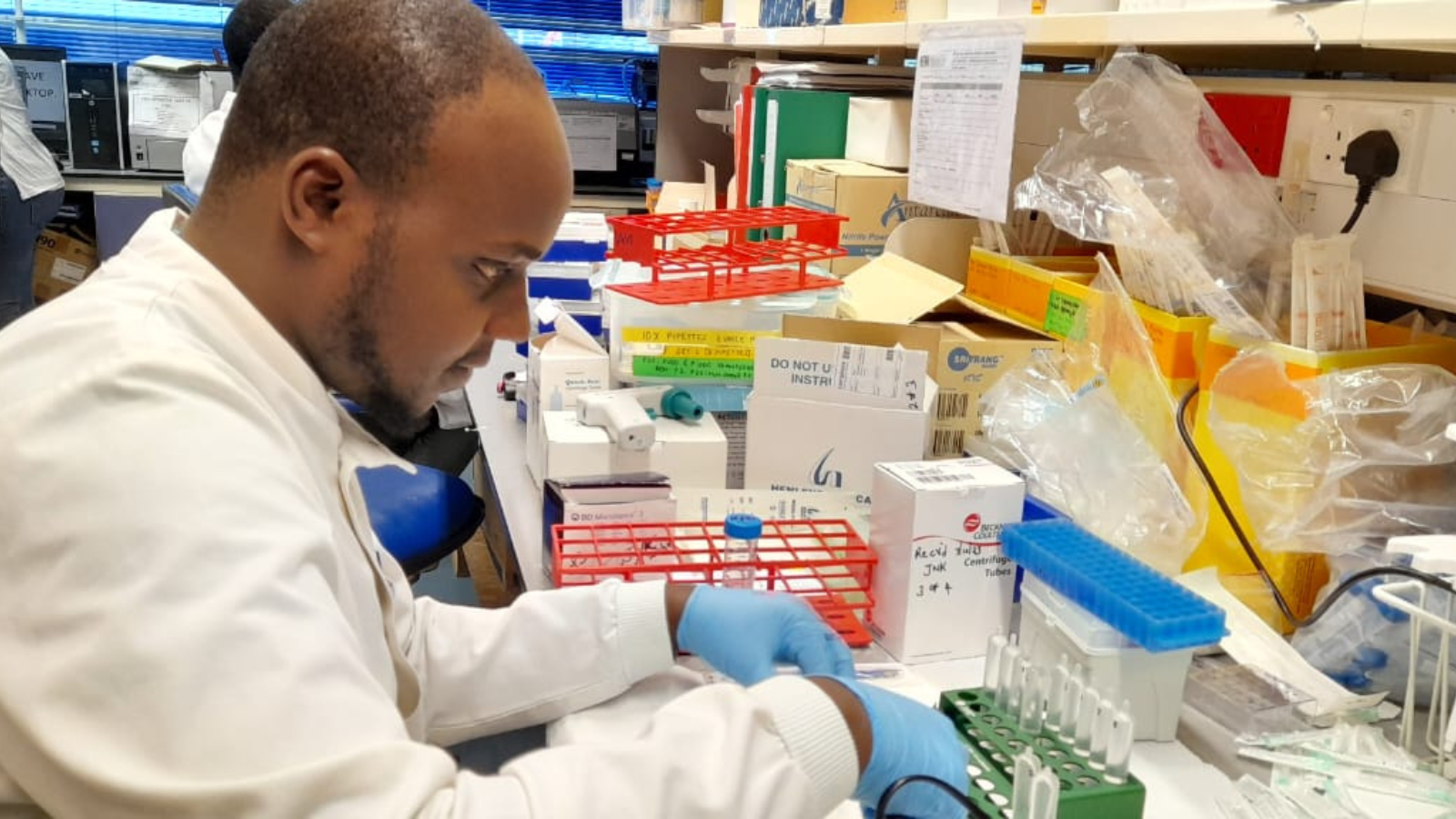 IAVI Early Career Investigator awardee, John Kimotho, in the lab at the KEMRI Wellcome Trust Research Program in Kilifi, Kenya. Credit: John Kimotho