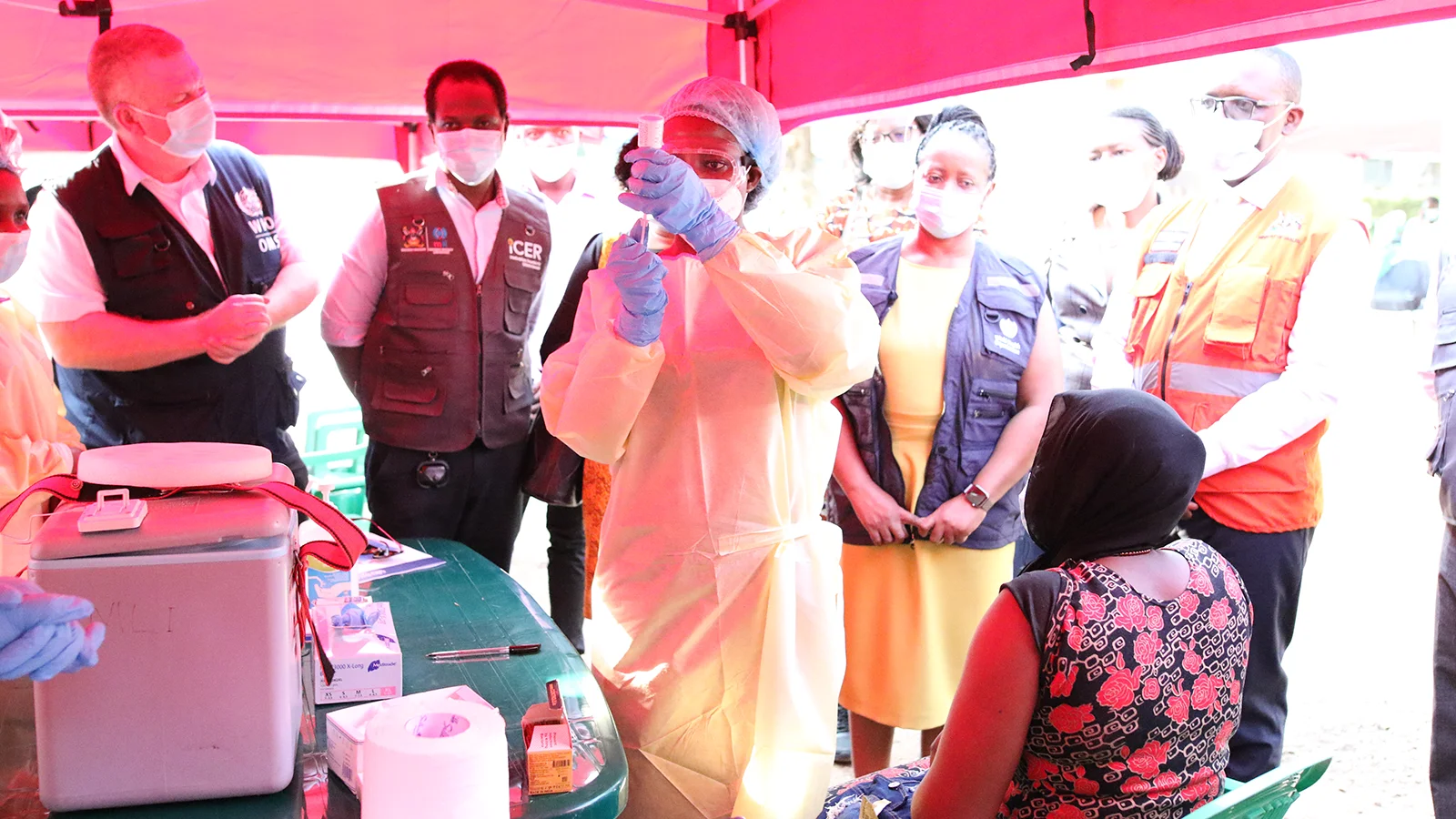 A health worker prepares to administer the first dose of IAVI's Sudan virus vaccine as part of a ring vaccination trial launched in response to an outbreak of Sudan virus disease in Uganda. Credit: WHO